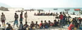 asylum seekers on beach
